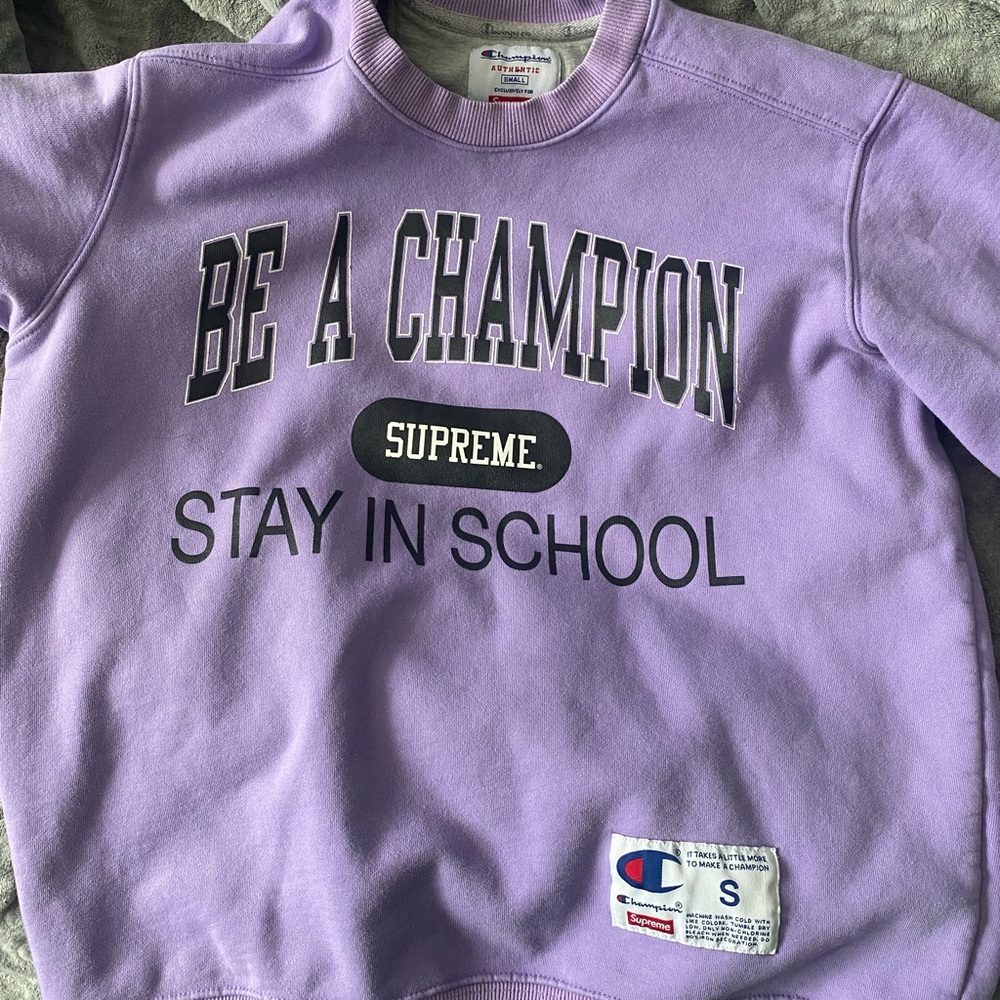 Purple champion and supreme collab sweat shirt